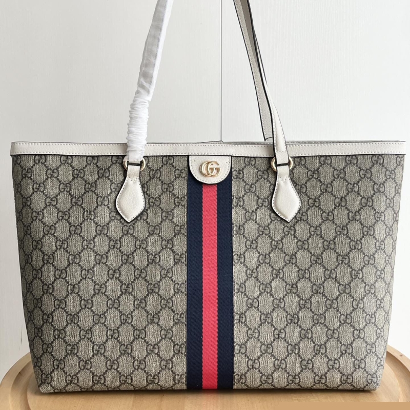 G*u*i shopping bags